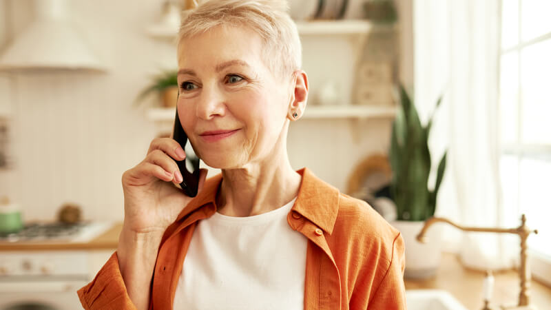 older woman speaking on the phone